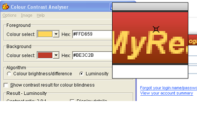 In Contrast Analyser, a box surrounds a pixel just above the text, where the red gradient that comes in contact with the text is lightest.